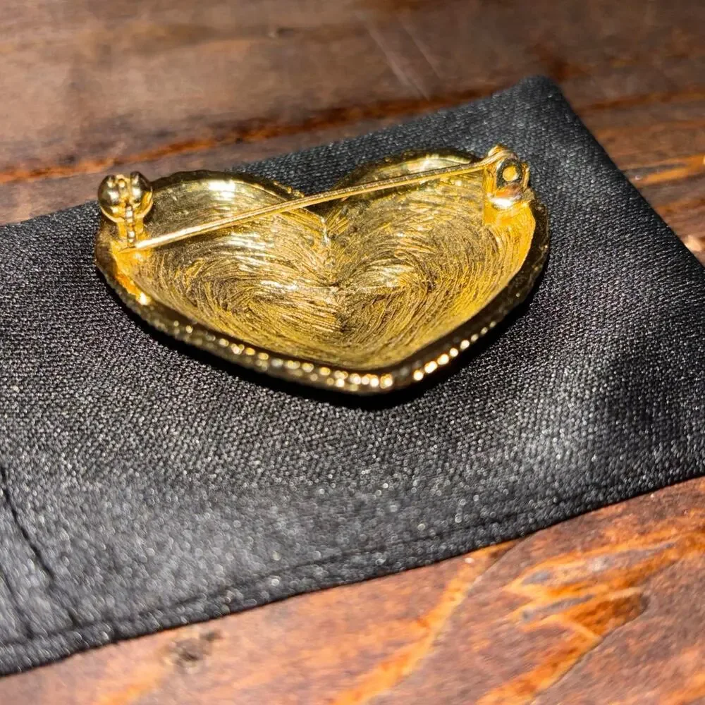 New gold heart brooch with textured surface